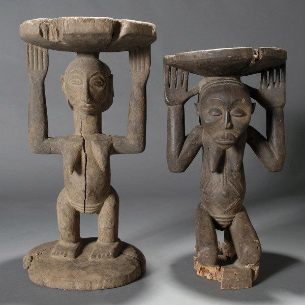 Two Luba Altars: Two HEMBA Altars. One a kneeling female, the other a standing. H = 18 inches. Condition: Both extensively weathered and eroded.