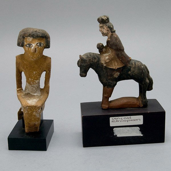 Ancient Egypt carving and another: Ancient Egyptian Painted Wood Carving, fragment from a larger item, Late Ptolemaic Period (200 BC- - A.D. 50); together with a painted wood horse and rider, perhaps GOA or Ethiopian. Height of figure 