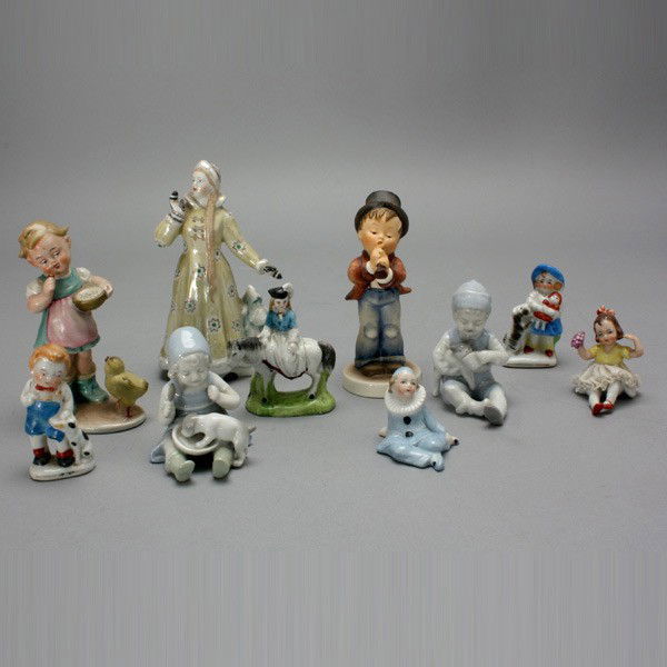 Ten Earthenware Figures of Children, several Germa: Ten Earthenware Figures of Children, several German, two stamped "Made in Occupied Japan", including a Hummel "Serenade"; a Goebel and a Russian {Height of tallest 5 3/4 inches}