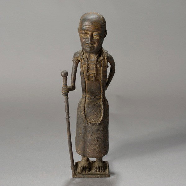 Yoruba bronze of elder man: YORUBA bronze of standing elder man with staff. Height 14 inches. In good condition. Property of an American diplomat working in Nigeria 1950s-1960s.
