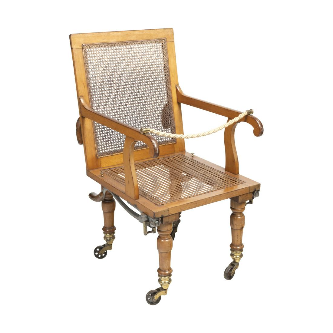 Victorian Elm Cane Seat and Back Sedan Chair: Victorian Elm Cane Seat and Back Sedan Chair. Caned back and seat, detachable rope, levers attached to back and sides, turned legs on large casters. Plaque to back reads 'J ALDERMAN / INVENTOR / Paten