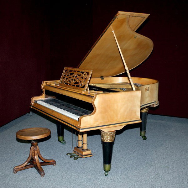 Biedermeier Fruitwood Baby Grand Piano with Stool: Biedermeier Fruitwood Baby Grand Piano with Stool Of typical form fitted with ivory keys, a pair of turned candlestand holders flanking the lyre shape music stand, raised on ebonized tapering legs, ea