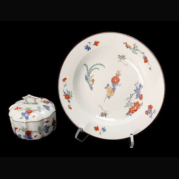 Two Meissen Porcelains in the Kakeimon Taste: Two Meissen Porcelains in the Kakeimon Taste The first, a shallow well bowl scattered with flowering sprays, a phoenix and a moth, gilt decorated and painted in palette of iron red, blue, turquoise en