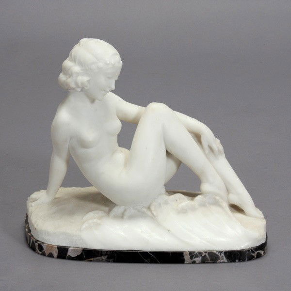 Mirelli Alabaster Figure of Venus: Art Deco Alabaster Figure of Venus The deity carved as a reclining nude in the waves coming out of the stylized sea, mounted on an integrated marble plinth base, the circular base inscribed "Morelle F