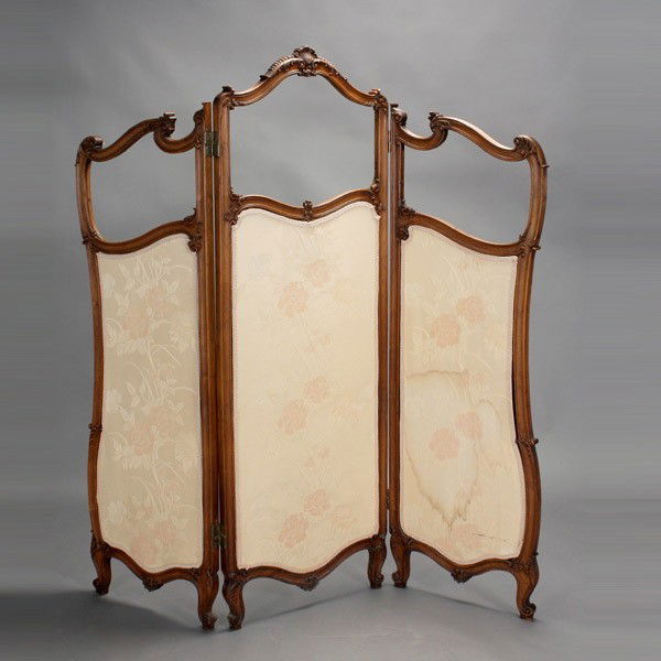 Art Nouveau Fruitwood Carved Three Panel Screen: Art Nouveau Fruitwood Carved Three Panel Screen in the Louis XV Style The upholstered center hinged panel headed by a cartouche frame with carved shell, adorsed by side upholstered panels with conform