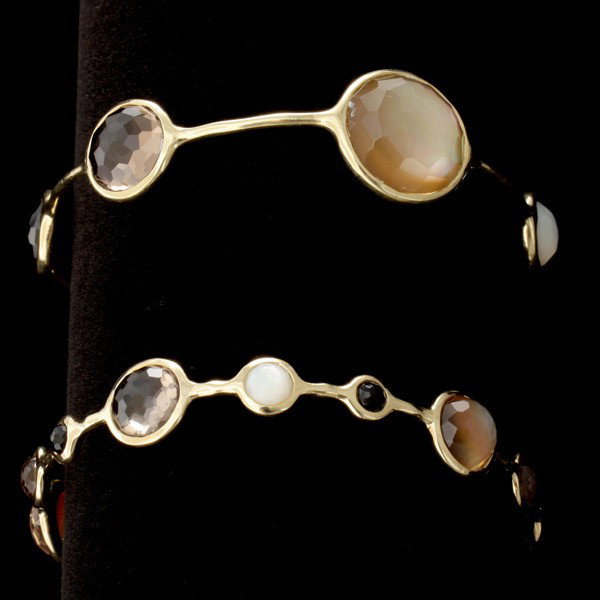 2 IPPOLITA MOP,QUARTZ,BLACK ONYX,18K Y/G BRACELET: COLLECTION OF TWO IPPOLITA MOTHER OF PEARL, QUARTZ, BLACK ONYX, 18K YELLOW GOLD BRACELETS. Including two Ippolita faceted topped mother of pearl, black onyx and quartz cabochons, each bezel set in 18k