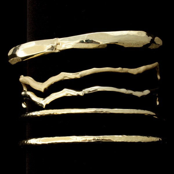 COLLECTION OF FIVE 18K YELLOW GOLD BRACELETS.: COLLECTION OF FIVE 18K YELLOW GOLD BRACELETS. Including three Ippolita 18k yellow gold bangles together with two 18k yellow gold bangles. 29.5 dwts {Note: Some broken, bent and scored.}
