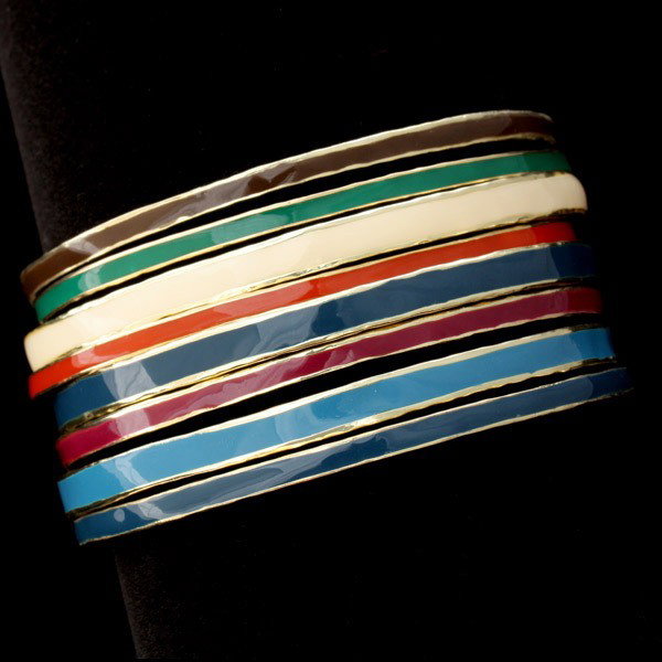 8 IPPOLITA ENAMEL, 18K YELLOW GOLD BRACELETS.: COLLECTION OF EIGHT IPPOLITA ENAMEL, 18K YELLOW GOLD BRACELETS. Including three blue, one purple, one white, one green, one brown and one red enamel, 18k yellow gold bangle. 39.8 dwts