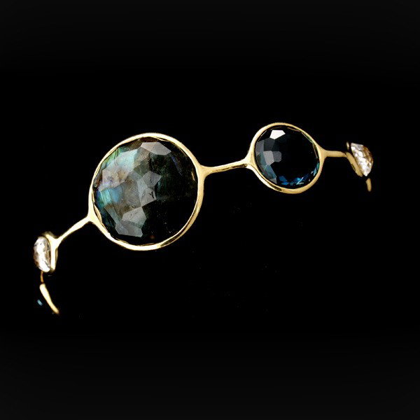 LABRADORITE,ONYX,QUARTZ,TOPAZ, 18K Y/G BRACELET.: IPPOLITA LABRADORITE, BLACK ONYX, ROCK CRYSTAL QUARTZ, BLUE TOPAZ, 18K YELLOW GOLD BRACELET. Featuring two large faceted topped round labrodorite cabochons, two black onyx, two rock crystal quartz and
