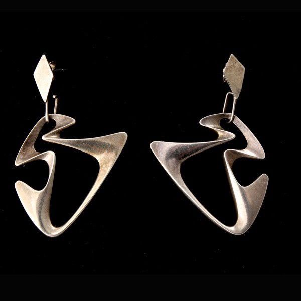 GEORG JENSEN STERLING SILVER EARRINGS.: GEORG JENSEN STERLING SILVER EARRINGS. The sterling silver abstract earrings are hallmarked Georg Jensen #125. Attributed to Henning Koppel for Georg Jensen. Note: The findings have been converted for