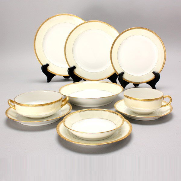Haviland Limoges Porcelain Dinner Service: Haviland Limoges Porcelain Partial Dinner Service: twenty-three dinner plates (diameter 9 3/4 inches, two with rim chip, one with crack); twenty-one lunch plates (diameter 8 5/8 inches); twelve soup b