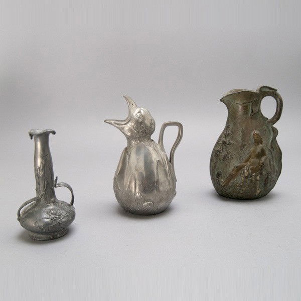 Three Art Nouveau Pewter Vessels: Three Art Nouveau Pewter Vessels, one stamped "J. Garnier", another stamped "Paris" {Height of tallest 6 7/8 inches}