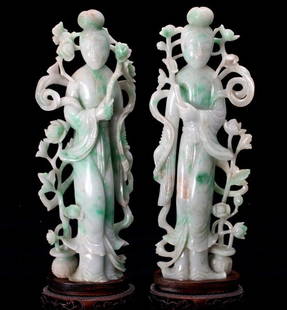 Two Jadeite Carvings of Beauties: Two Jadeite Carvings of Beauties, Both of mirror imaged forms, shown standing dressed in long robes with hair carefully arranged into a large chignon, surrounded by a billowing sash and a network of