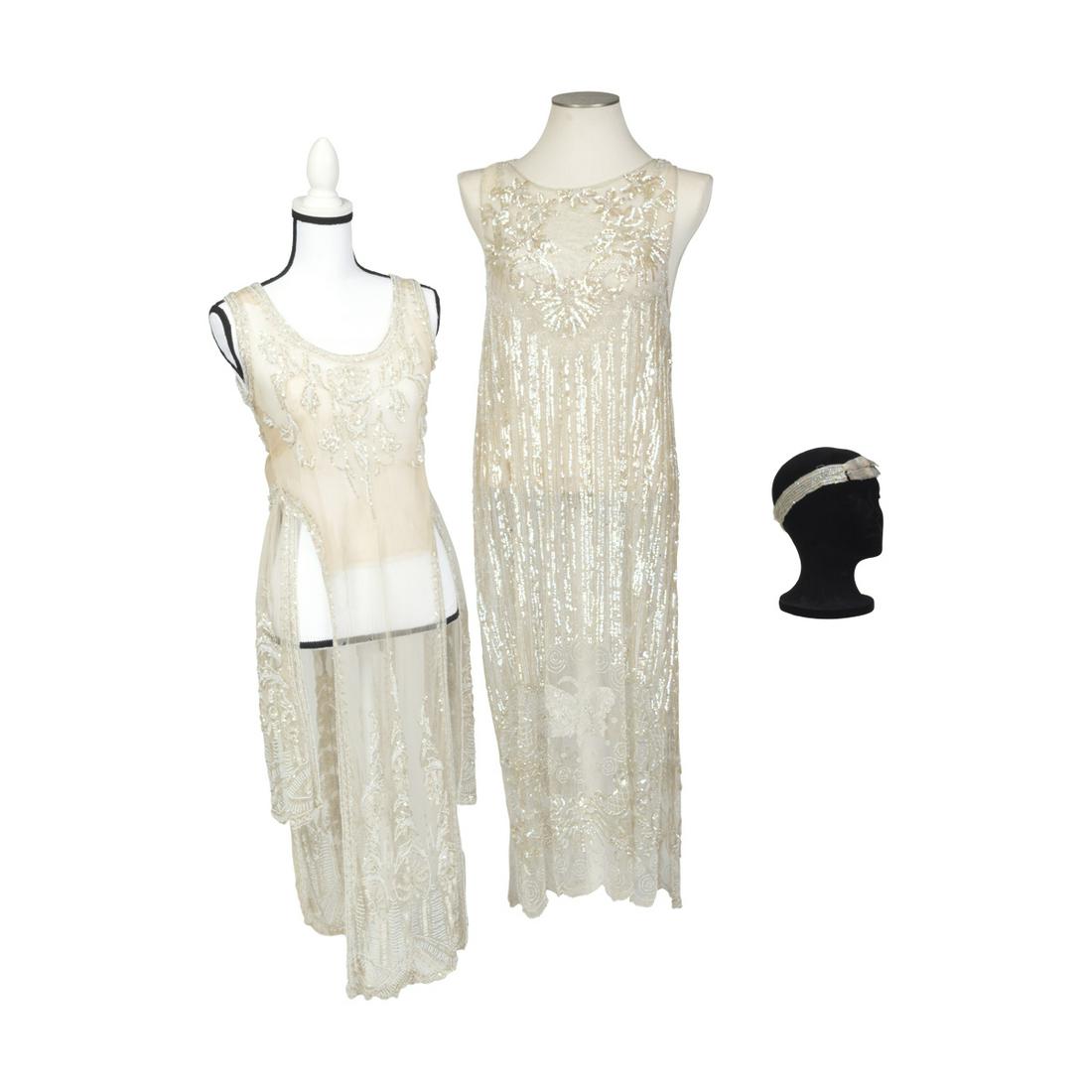 Two Ecru Gauze Sequin, White Bead Dresses.: Two Ecru Gauze Sequin, White and irridescent Bead Dresses. Both unlined and sleeveless. The first, with panel cut front and back, beaded in vertical bands, and gorges or flaps with foliate and scroll 
