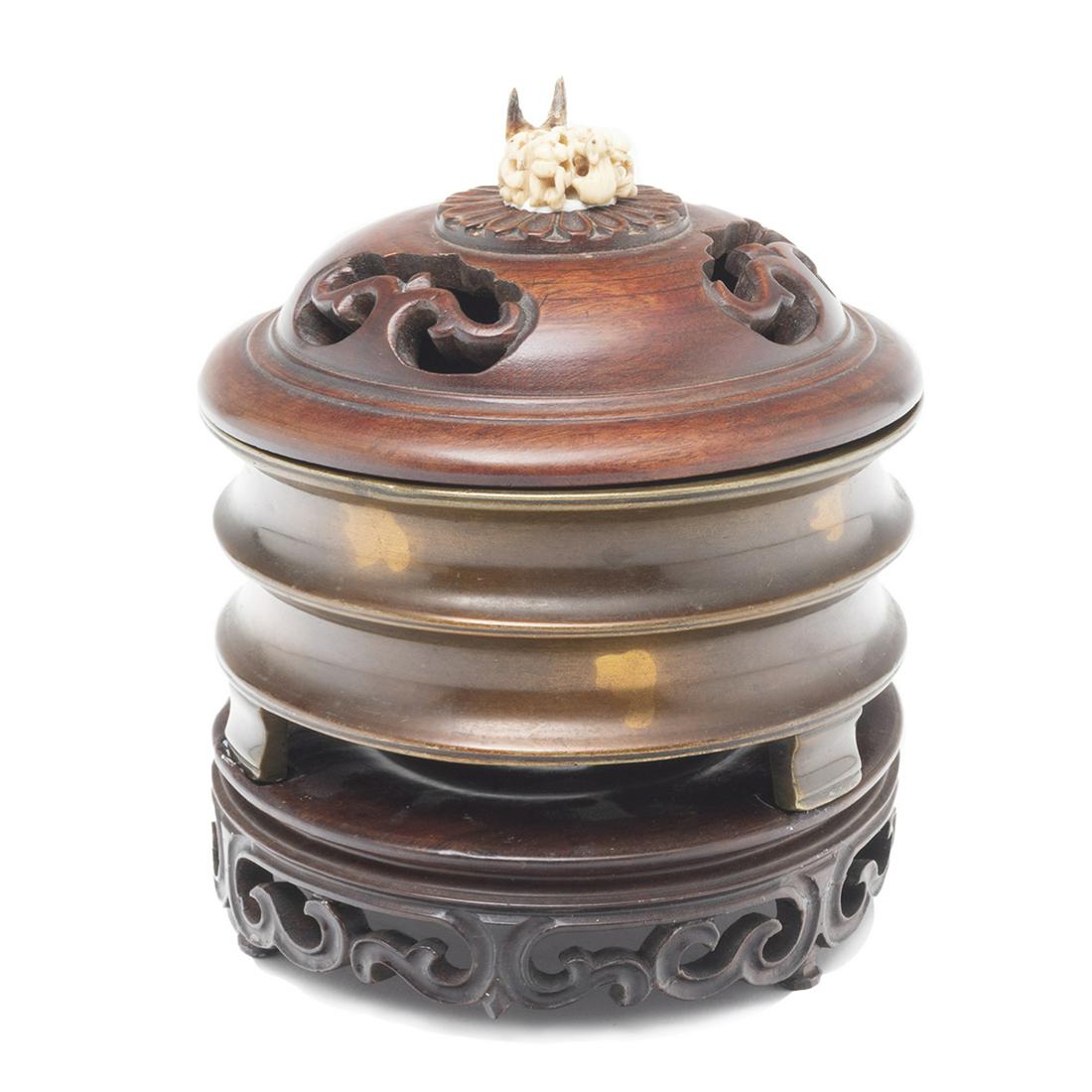 A Chinese Gilt Bronze Tripod Censer and Cover (1 of 3)