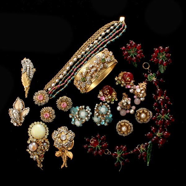 COLLECTION OF MIRIAM HASKELL COSTUME JEWELRY.: COLLECTION OF MIRIAM HASKELL COSTUME JEWELRY. Including one bangle bracelet, four brooches, one bracelet and earring suite, one necklace and earring suite (as is) and four pairs of ear clips all signe