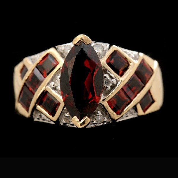 GARNET, DIAMOND, 10K YELLOW GOLD RING.: GARNET, DIAMOND, 10K YELLOW GOLD RING. Centering one marquise-cut garnet flanked by ten square-cut garnets weighing a total of approximately 1.50 ct., further enhanced by six single-cut diamonds weigh