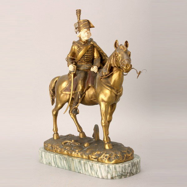 G.Omerth Gilt Bronze Figure of Soldier on Horsebac: George Omerth Gilt Bronze and Marble Figure of a Soldier on Horseback, signed G. Omerth {Height with base 15 inches; length 11 inches} [Bridle broken]