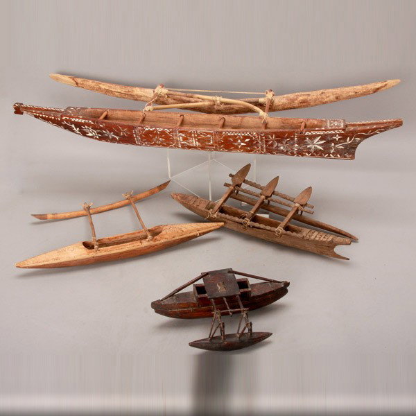 4 canoe models Polynesia Polynesian art: Four outrigger canoe models. POLYNESIA. Wood and cane. Length of largest 41 1/2 inches. In fair condition, some loose parts, some breakage.