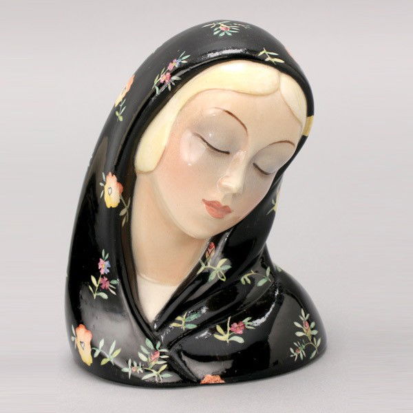 Lenci Ceramic Bust of a Blond Haired Young Lady: Lenci Ceramic Bust of a Blond Haired Young Lady with Black Veil, modeled with her head bent and her eyelids closed, the veil with hand painted floral sprigs, marked on base "Lenci/ Made In Italy", art
