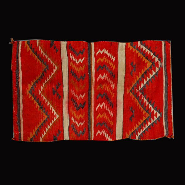 Native American Indian. Navajo blanket: Native American Indian. Transitional Blanket. Navajo Banded blanket design with diamond patterns in red, white, brown, and black yarns. Originally purchased in New Mexico when New Mexico was a territo