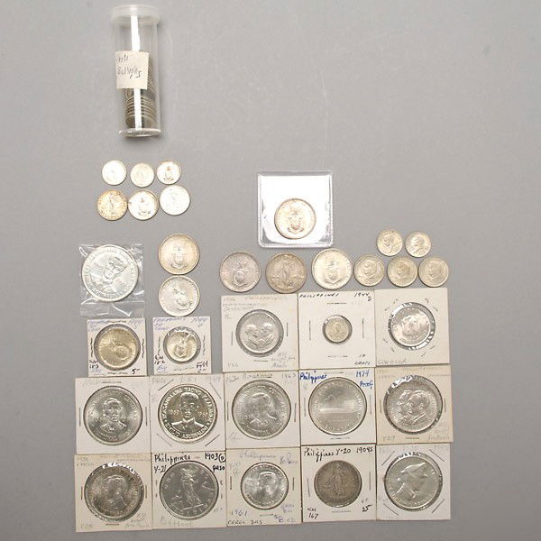 Collection of fifty-seven Philippine Silver Coins: Collection of fifty-seven Philippine Silver Coins. Provenance: From the Richard Smith Collection