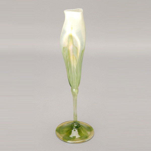 Tiffany Studios Floriform Translucent Glass Vase: Tiffany Studios Floriform Translucent Light Green Glass Vase with opalescent at the top with pulled feathering, foot decorated with pulled feathering, signed L.C.T. Y7762 {Height 12 inches}