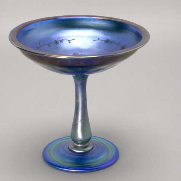 Tiffany Blue Favrile Compote with Floral Motif: Tiffany Blue Favrile Compote with Intaglio Engraved Floral Motif signed L.C.Tiffany Favrile 1747P {Height 6 inches, diameter of top 6 1/2 inches}