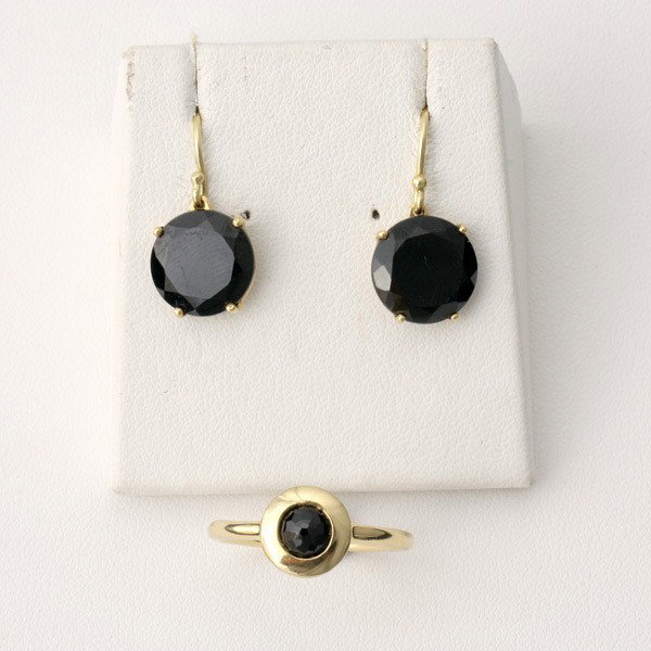 COLLECTION OF BLACK ONYX, 18K Y/G JEWELRY.: COLLECTION OF BLACK ONYX, 18K YELLOW GOLD JEWELRY. Including one faceted black onyx, 18k yellow gold ring, size 7, signed Ippolita; together with a pair of black onyx, 18k yellow gold earrings, signed