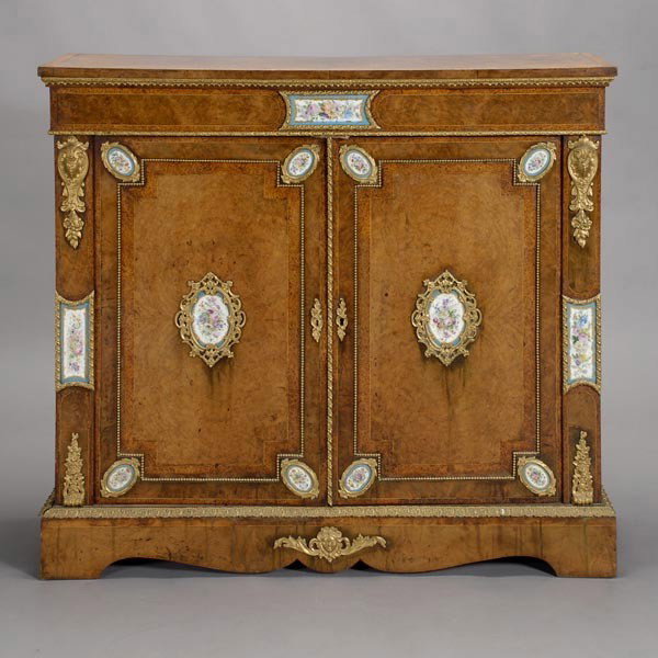 Louis XV Style Gilt & Porcelain Display Cabinet: Louis XV Style Gilt Bronze Porcelain Mounted Display Cabinet, Fourth Quarter 19th Century, The outstepped cornice with a leaftip band, over a frieze with floral medallion, over twin molded doors with 