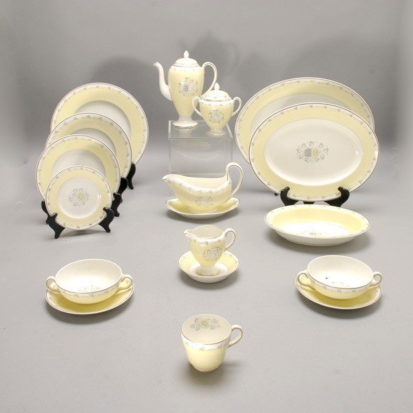 Wedgwood Bone China Service in the Cynthia Pattern: Wedgwood Bone China Service in the Cynthia Pattern: twelve dinner plates (diameter 10 1/2 inches); eight lunch plates; eight dessert plates (diameter 8 inches); ten fruit bowls; eight bouillon and eig