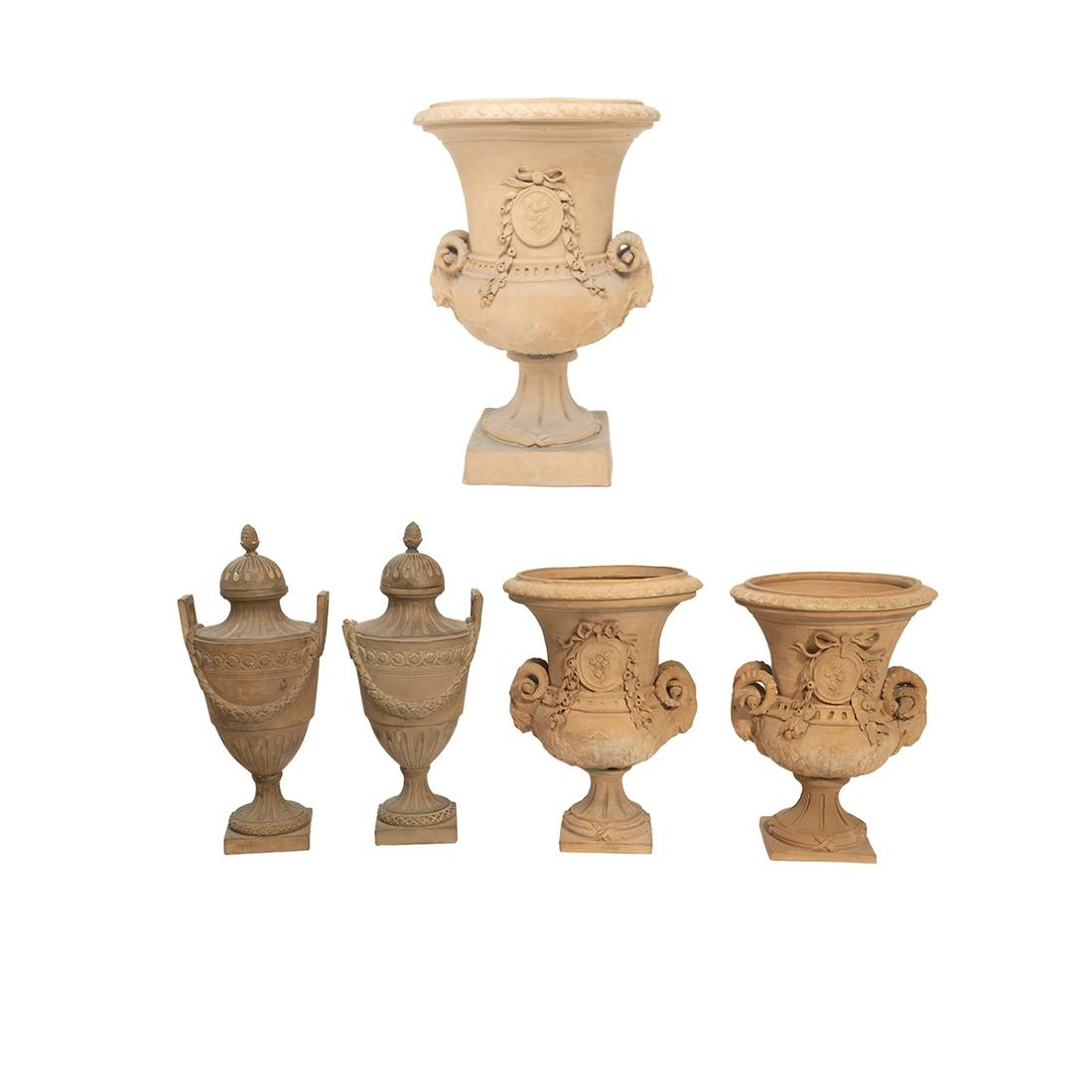Five Terracotta Urns, Jardinieres: Five Terracotta Urns, Jardinieres All modelled in Neoclassical manner, comprising a pair of Sevres style, with domed lids and acorn knops and squared handles; and a suite of three vases with goat's he