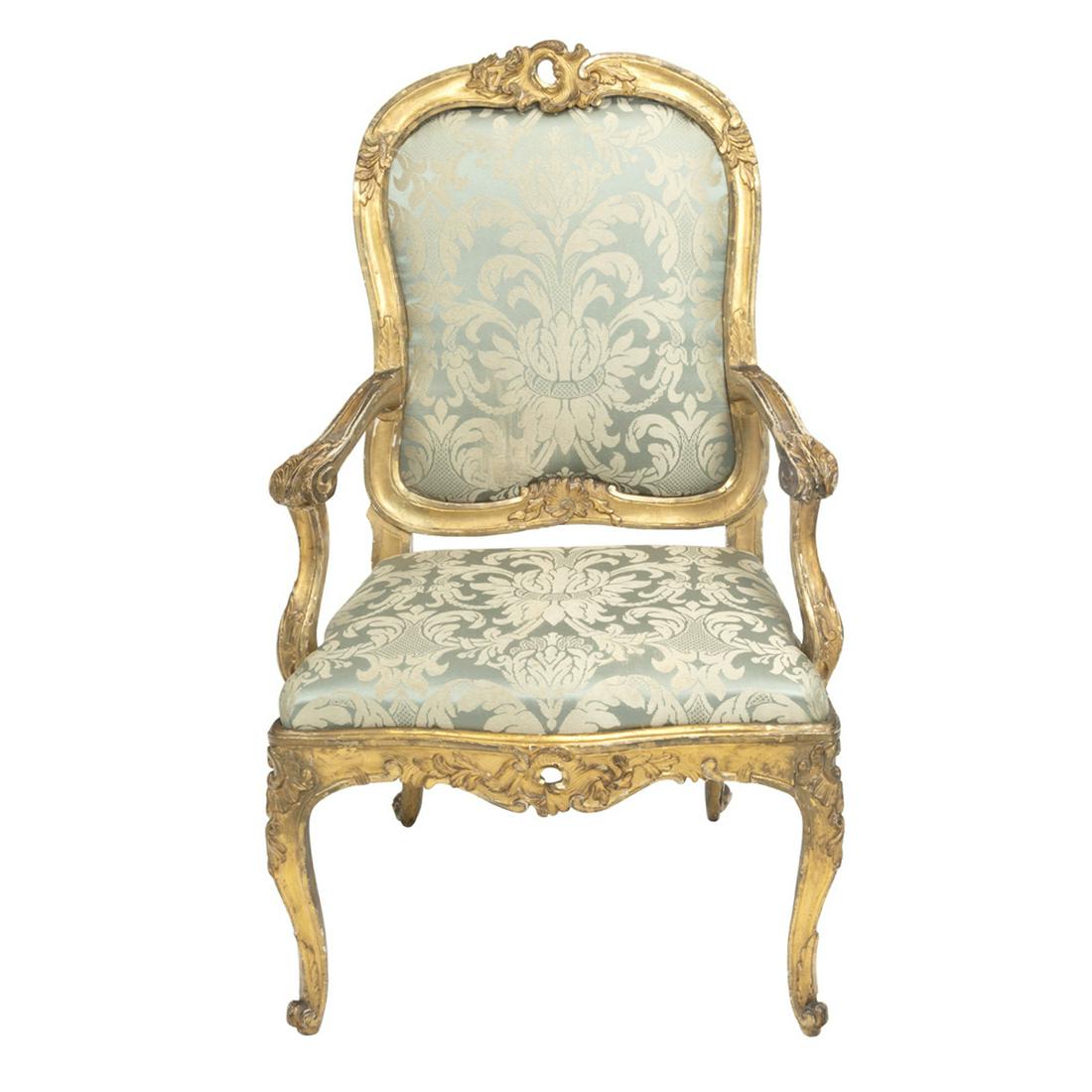 Louis XVI Style Giltwood Fauteuil: Louis XVI Style Giltwood Fauteuil. The carved giltwood frame with green silk brocade foliate pattern upholstery. {Approximate dimensions: 43 1/4 high x 26 1/4 wide x 26 inches deep.}. Condition: Wear,