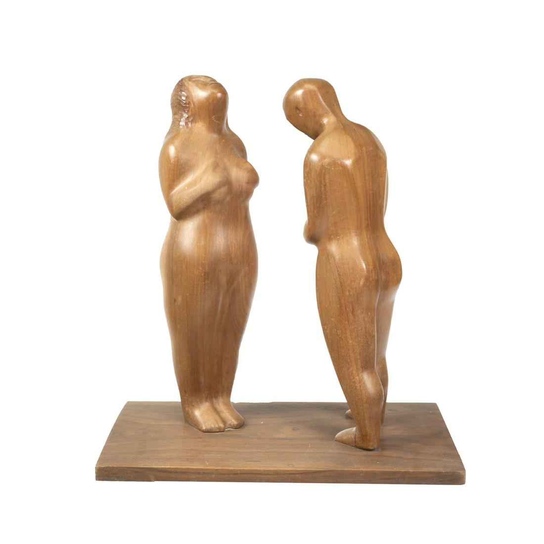 Manner of William Zorach, Man and Woman, wood figures: Manner of WILLIAM ZORACH (American, 1887-1966), Man and Woman Figures, carved wood sculptures, (Approximate dimensions - overall: 20.75 x 20 x 11.5 inches).