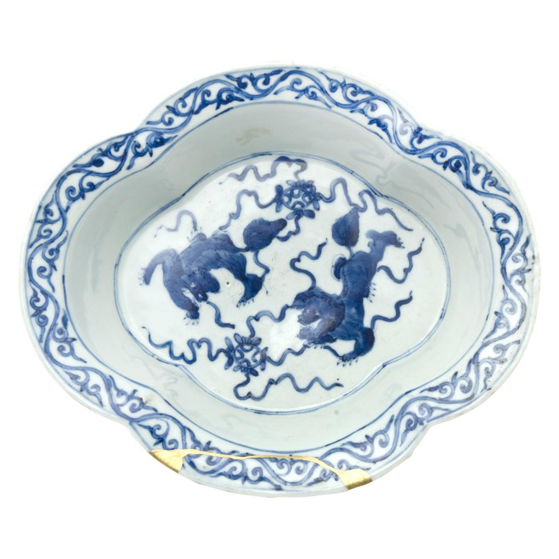 Chinese Blue and White Lobed Brush Washer: Chinese Blue and White Lobed Brush Washer. Of quatre-lobed section with a flat base and an everted rim, decorated around the exterior with eight panels, each painted with meandering lotus scrolls supp