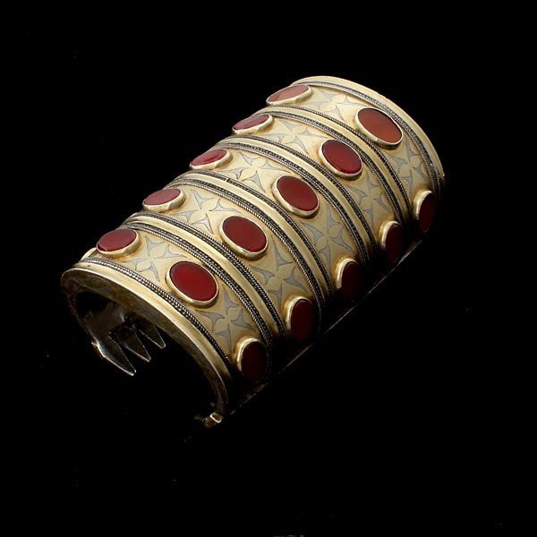 CARNELIAN, GLASS, SILVER GILT TRIBAL CUFF. - 2