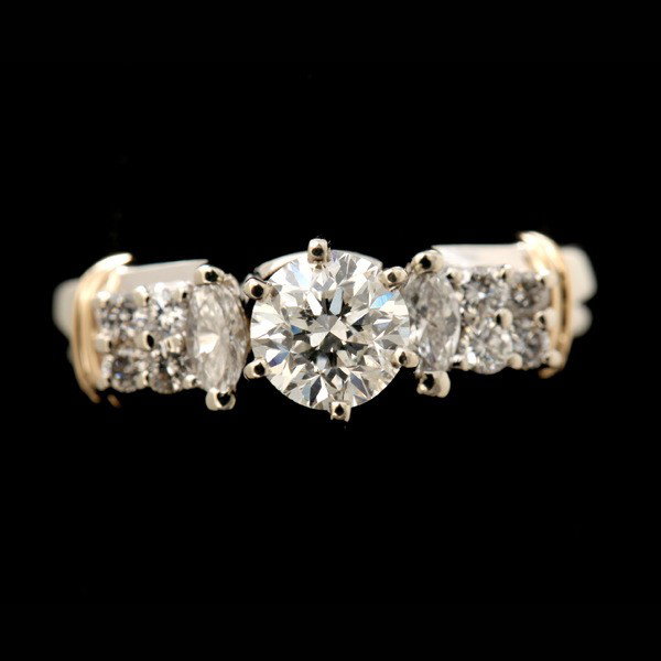 DIAMOND, 14K WHITE GOLD WEDDING RING SET.: DIAMOND, 14K WHITE GOLD WEDDING RING SET. Featuring one round brilliant-cut diamond, weighing approximately 0.67 ct., flanked by two marquise-cut diamonds weighing a total of approximately 0.15 ct., a