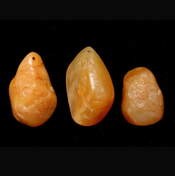 Three Small Yellowish Stone Carvings: Three Small Yellowish Stone Carvings, each similarly carved with two bats encircling coins {Length: 1 1/2 inches (3.8 cm)}