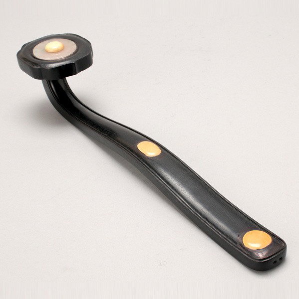 An Ivory Inlaid and Stained Hardwood Ruyi Scepter*: An Ivory Inlaid and Stained Hardwood Ruyi Scepter*, of slender and simple form, inlaid with ivory and jadeite {Length: 15 1/4 inches (38.7 cm)}