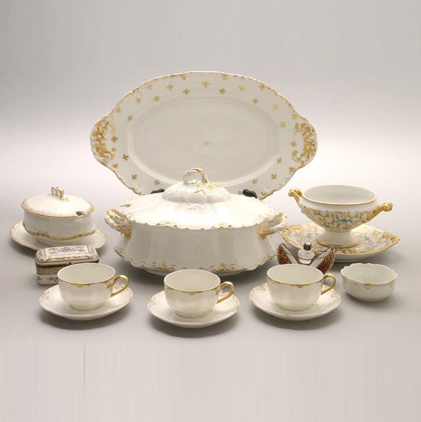 French Limoges Porcelain Dinner Wares 20: Assembled Group of French Limoges Porcelain Dinner Wares and Boxes: a sauce dish with undertray; a covered casserole (height 7 1/4 inches, length 12 1/2 inches); a small covered dish; a serving platte