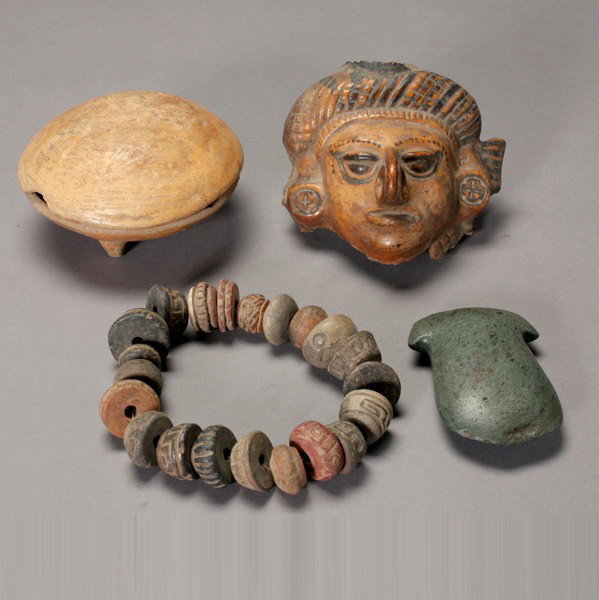 4 pre-columbian ceramic and stone items: Four Latin American ceramic and stone items: a Valdivia stone axe blade; a large head (fragment from a figure); a lidded tripod plate; and a strand of twenty one (21) spindle whorls. Provenance: the e