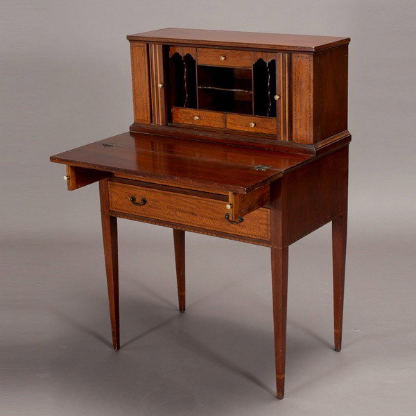 Edwardian Inlaid Bonheur du Jour: Edwardian Inlaid Mahogany Miniature Bonheur du Jour The sliding tambour door enclosing drawers and valanced pigeon holes, over a pull out writing surface and a pair of drawer pulls, over twin long dra