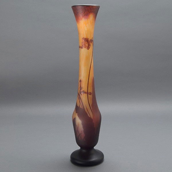 Daum Nancy Cameo Glass Vase, circa 1910: Daum Nancy Cameo Glass Vase The bottle form in grey colored glass with orange mottling, a long cylindrical flaring neck, and cushioned foot, overlaid in orange and red, with an intaglio signature "Dau