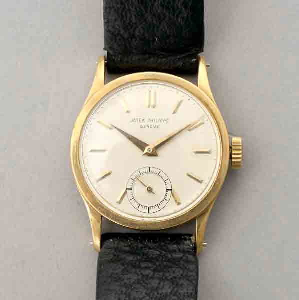 PATEK PHILIPPE CALATRAVA 18K Y/G WRISTWATCH.: PATEK PHILIPPE CALATRAVA 18K YELLOW GOLD WRISTWATCH. Dial: Round, textured, off white, applied gold baton hour markers, sunken subsidiary seconds dial at 6 o'clock, outer minutes track, gold dauphine