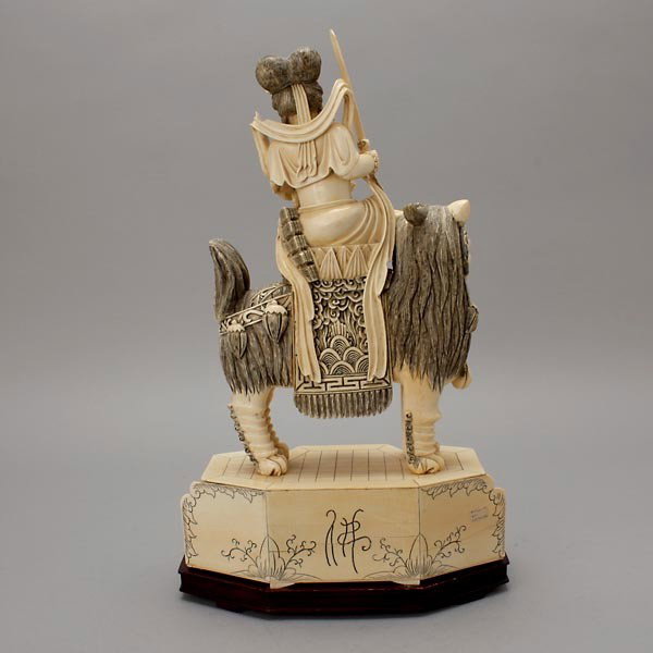 A Carved Ivory Figure Riding a Beast* - 2