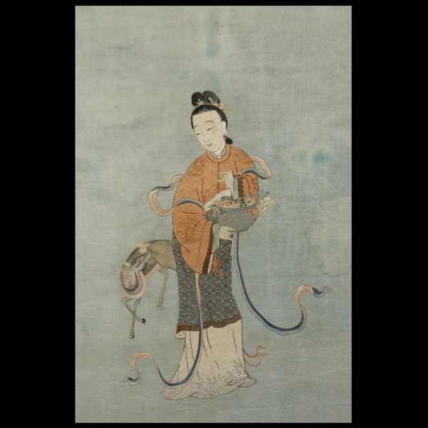 An Embroidered Silk Panel of Female Immortal & De: An Embroidered Silk Panel of a Female Immortal and Deer, Depicting the figure of Magu holding a basket of lingzhi and seasonal flowers, wearing intricately embroidered garments displaying bats, peache