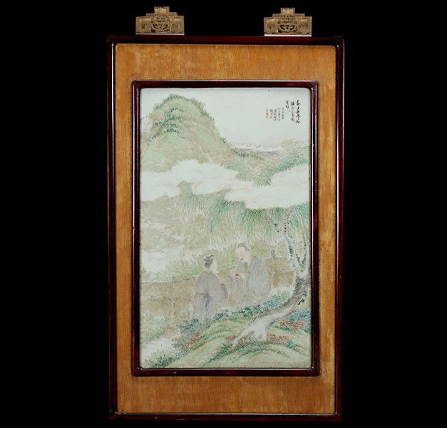 A Large Qianjiang Style Hanging Porcelain Plaque: A Large Qianjiang Style Hanging Porcelain Plaque, Painted in the Qianjiang style with two scholars in deep conversation within a garden setting, inscribed with seals and a signature. Early 20th Centur