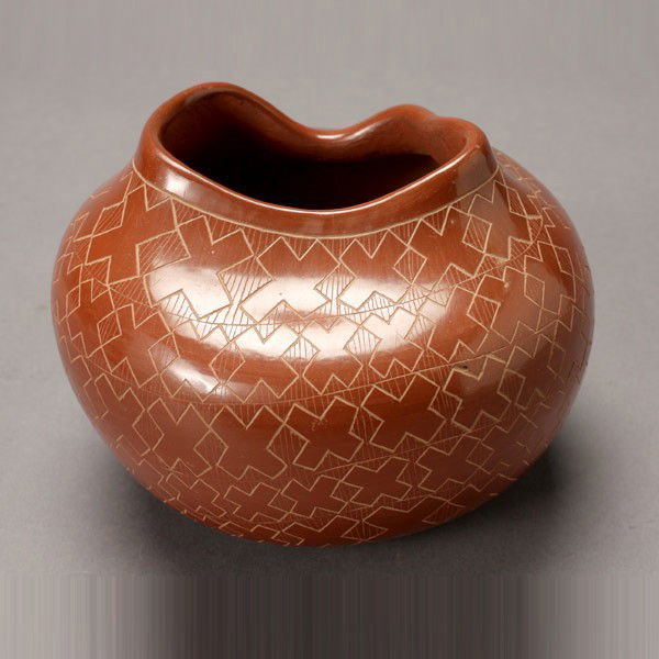 Redware bowl with wavy rim: POLLY BEAR (Santa Clara). Redware bowl with wavy rim, sgraffito bands with cross motif. 5 1/2 inches. In very good condition.l