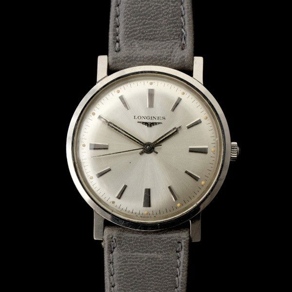 LONGINE STAINLESS STEEL WRISTWATCH.: LONGINE STAINLESS STEEL WRISTWATCH. DIAL: Round, satin textured silvered, applied baton hour markers, outer minutes track with luminous dots, luminous baton hands, center sweep seconds hands, Longines