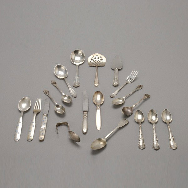 Assembled Group of Sterling Flatwares (19): Assembled Group of Sterling Flatwares; including a three piece A. Mechelsen Copenhagen enamel inset child's set; a Georg Jensen child's spoon and knife; eight teaspoons; a sugar shell; a Gorham servin
